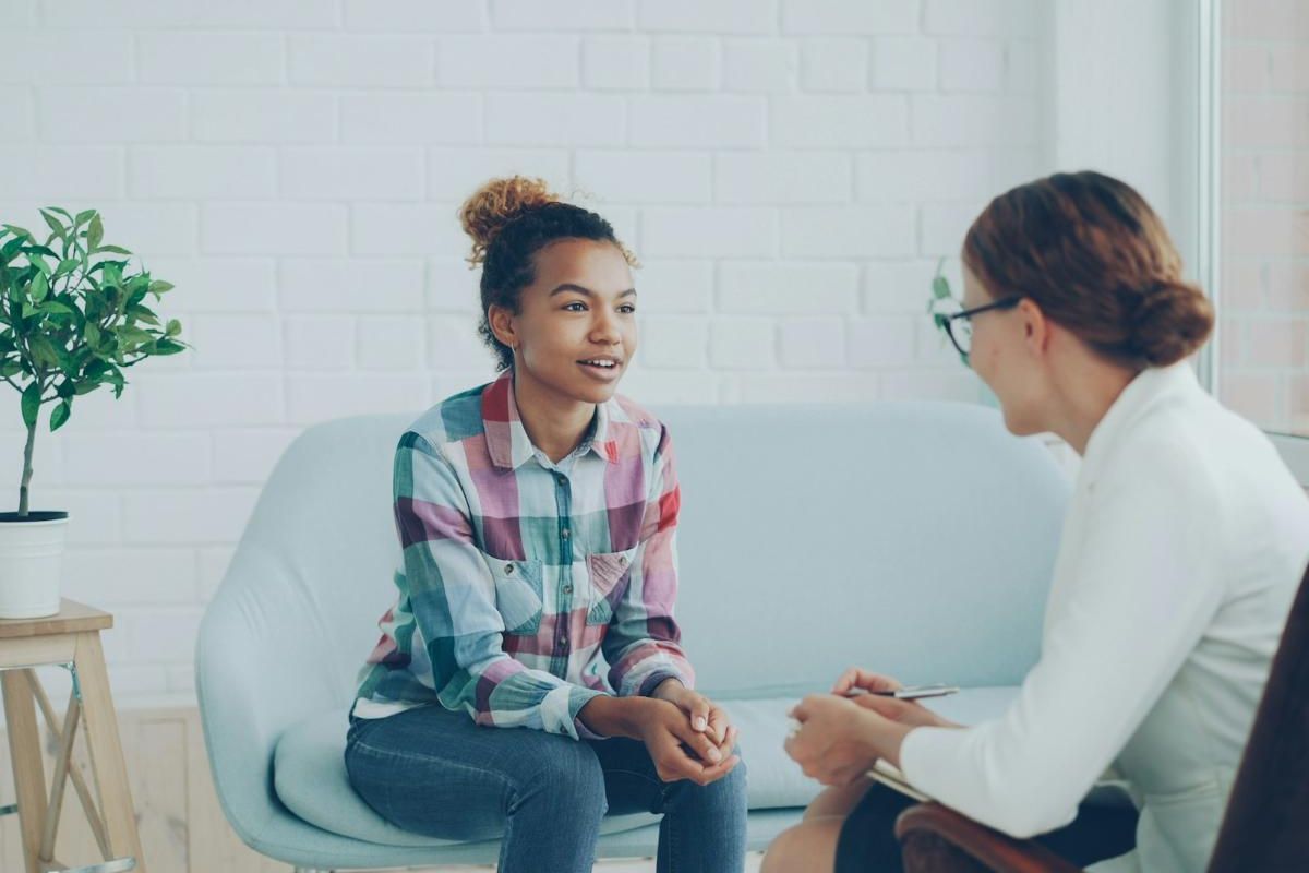 Study coordinator talking with a volunteer